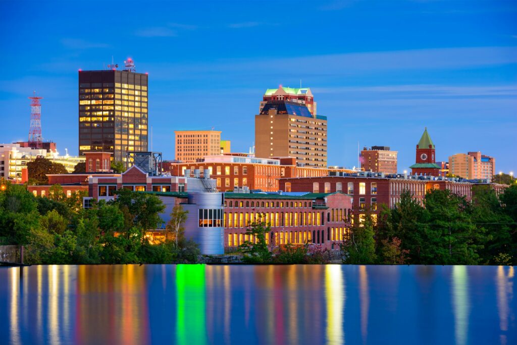 Skyline of Manchester, NH, featuring the city's architectural landmarks and Clear to Launch Dental Marketing' comprehensive dental marketing solutions designed for Manchester dental practices.