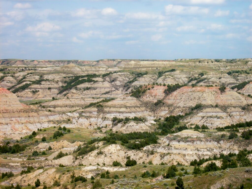 Scenic view of the North Dakota Badlands located in the southwest portion of the state, showcasing the great nature landscape near Grand Forks, ND, and Clear to Launch Dental Marketing' strategic dental marketing initiatives tailored for Grand Forks dental practices.