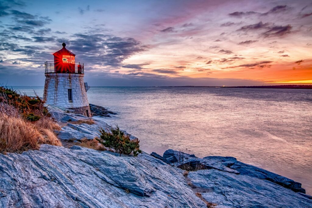 Sunset at Castle Hill Lighthouse in Newport, Rhode Island, capturing the picturesque coastal scenery and Clear to Launch Dental Marketing' strategic dental marketing initiatives tailored for Cranston dental practices.