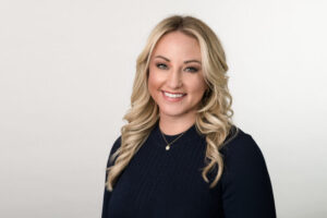 Professional headshot of Dr. Jobe, pediatric dentist at Kids Smiles Pediatric Dentistry in St. Louis, MO.