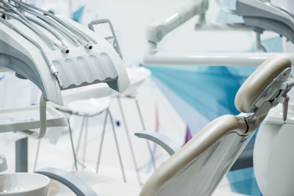 Modern dental chair and equipment in a clean office, representing the different marketing needs of startup and established dental practices