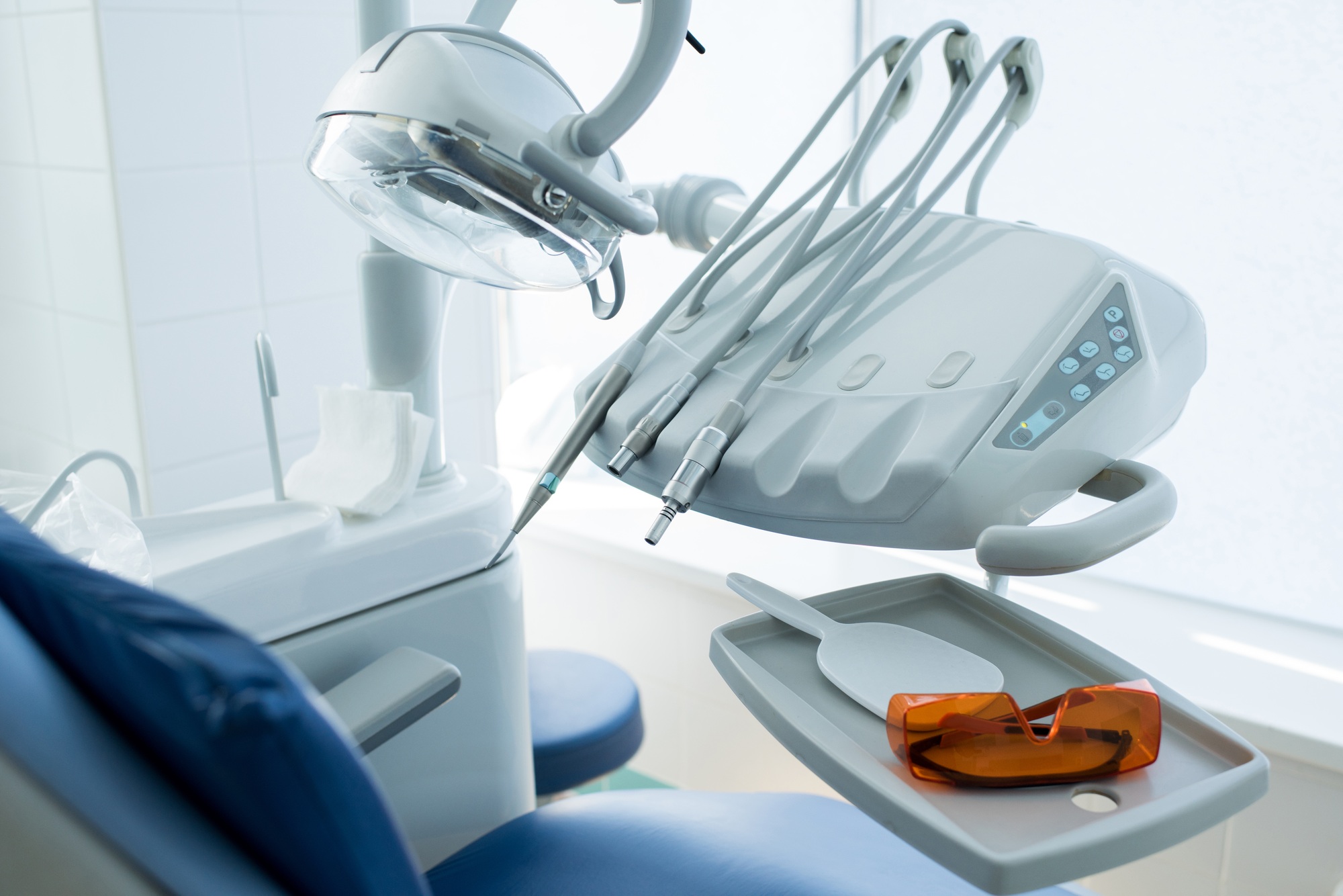 Close-up of dental equipment in a modern treatment room, symbolizing a well-established dental practice using Google Business Profile to attract patients